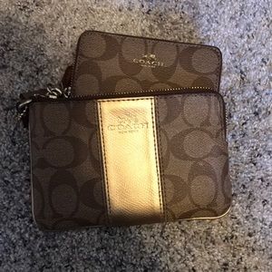 one coach wristlet, one coach wallet